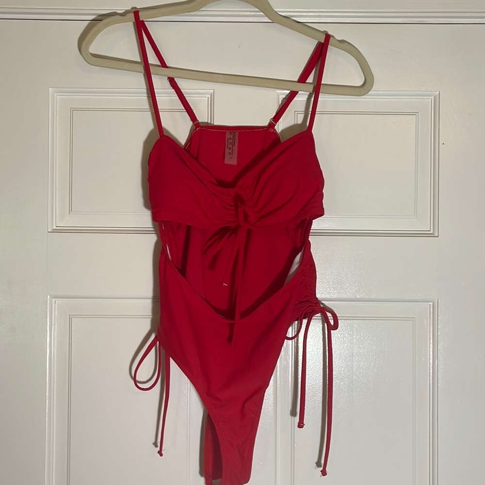 NWOT red one piece swimsuit cute and cheeky size large